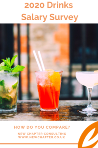 an image of red and white cocktails on a wooden table with straws